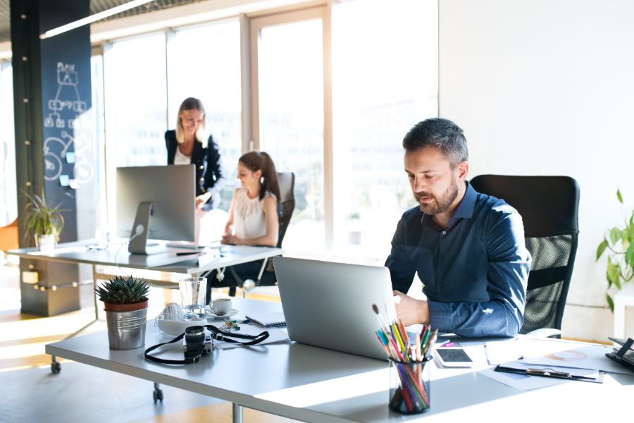 Man-Focused-Working-Laptop_167781326